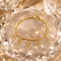 Crystal Dollar Charm Bracelet Gold